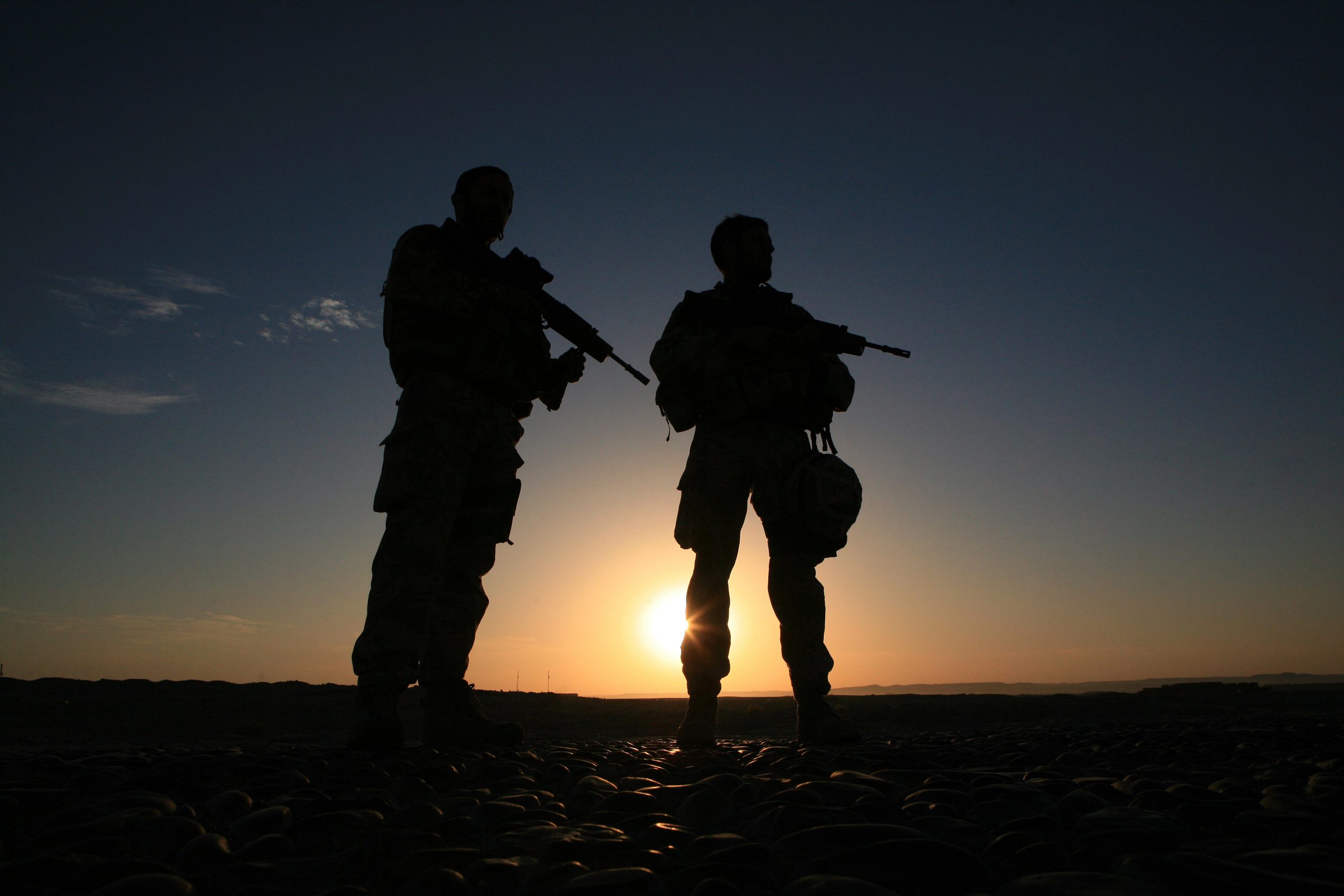 Defence personnel at dusk